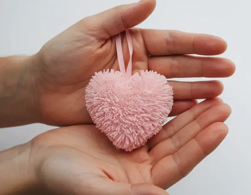 Cute pink fuzzy heart ornament idea - perfect for Valentine's decor or a handmade gift